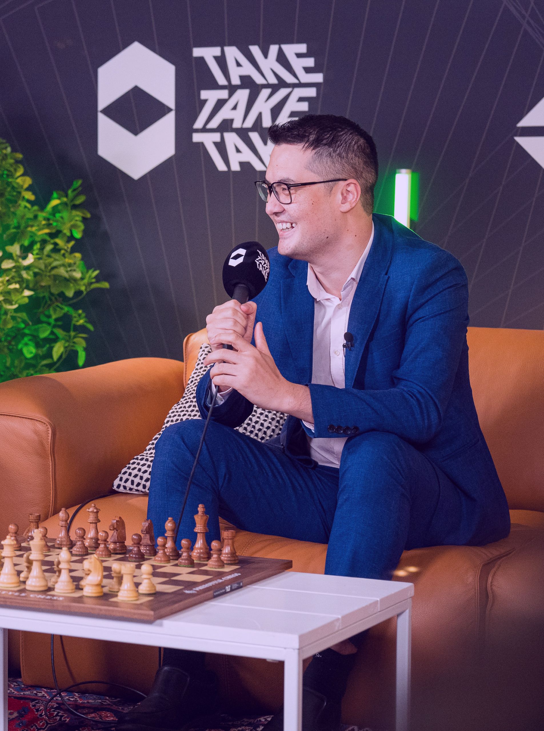 Take Take Take creator interview setup with a chess board